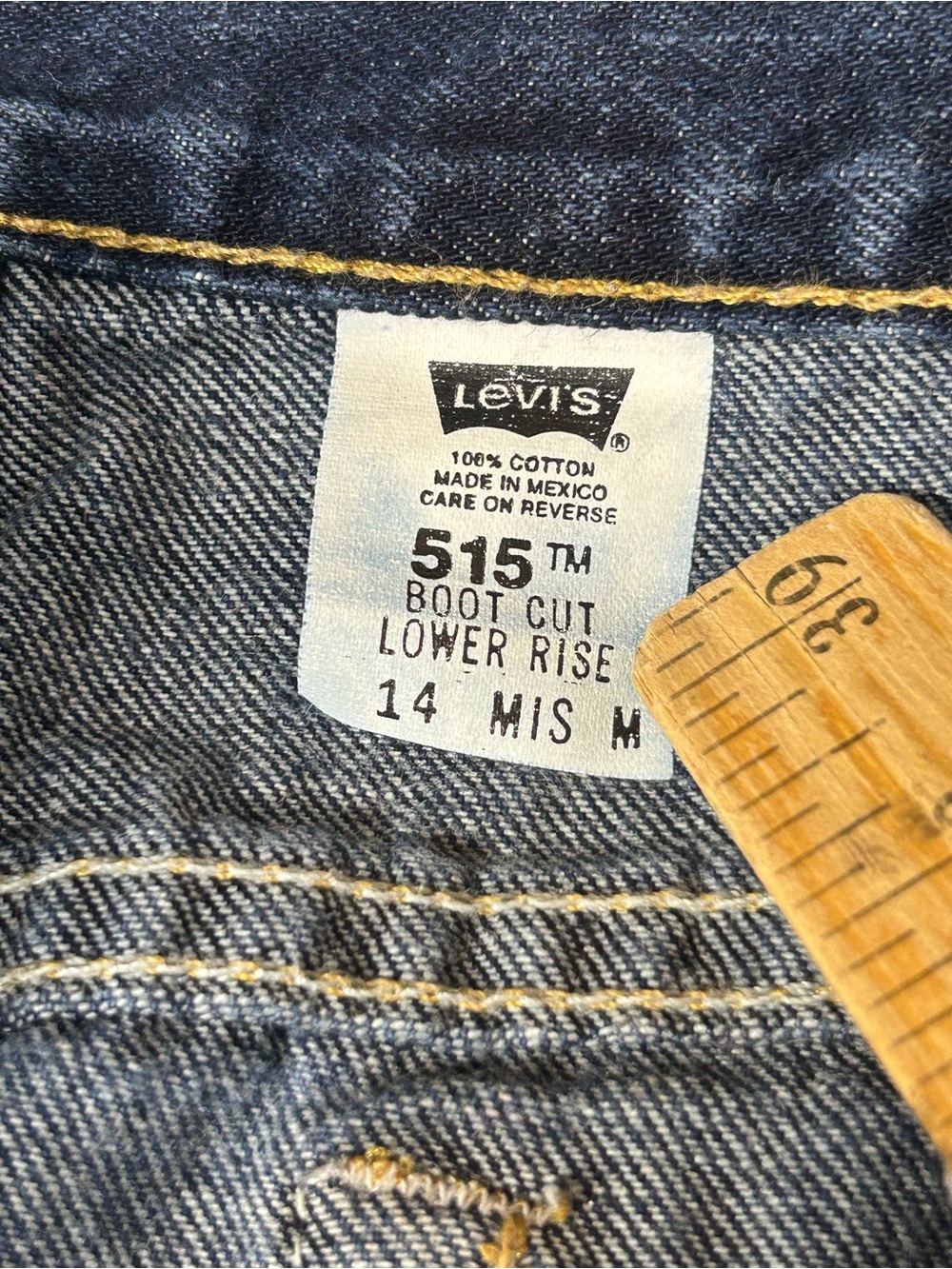 Levi's 515 Bootcut Jeans in Dark Blue Denim with Gold Stitching